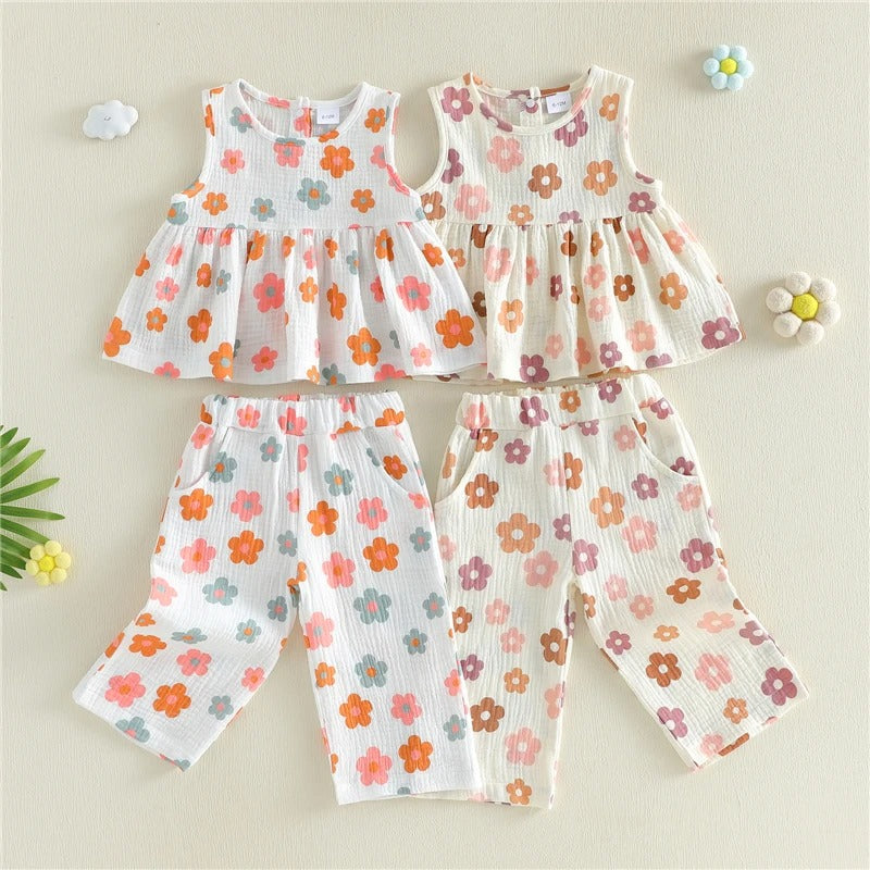 Flowy Sleeveless Top With A Full Floral Print Paired With Pocketed Pants
