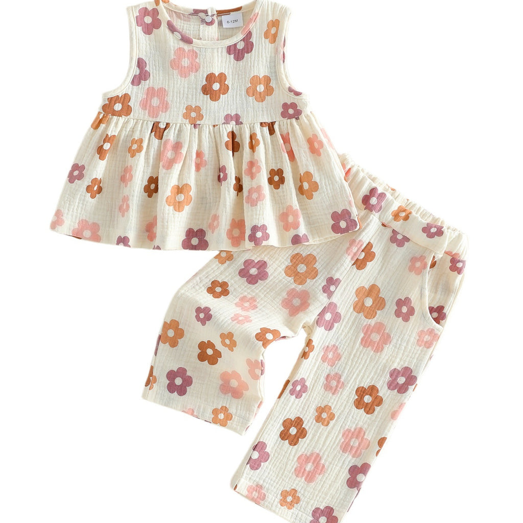 Flowy Sleeveless Top With A Full Floral Print Paired With Pocketed Pants
